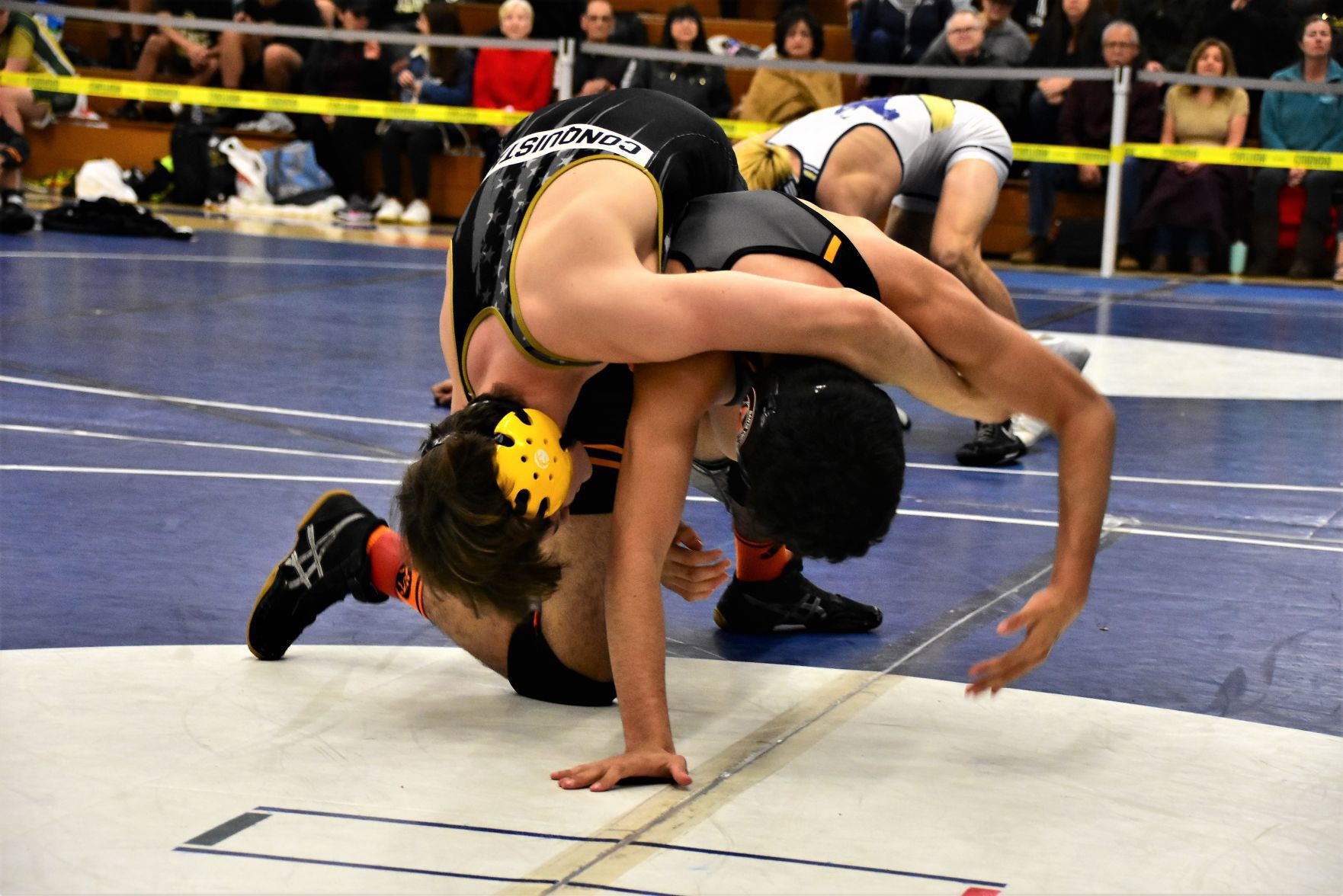 Santa Ynez Freddy Lemmex (Bottom) works to escape from Cabrillo's Blake Rehder